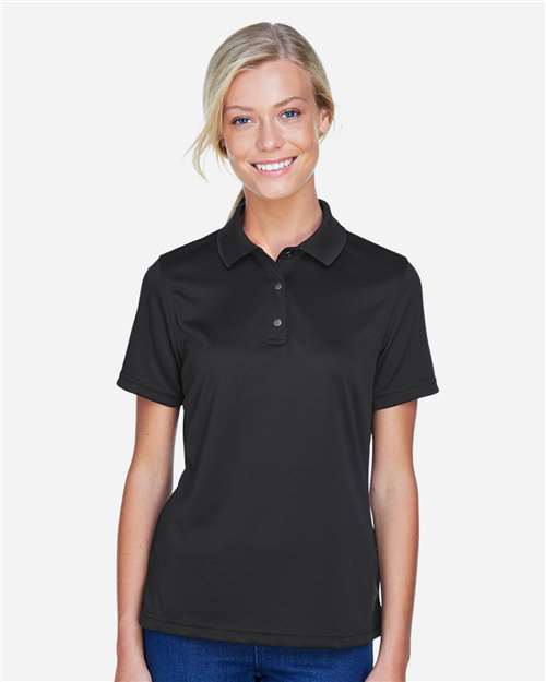 Harriton M345W Women's Advantage Snag Protection Plus IL Snap Placket Polo in Black